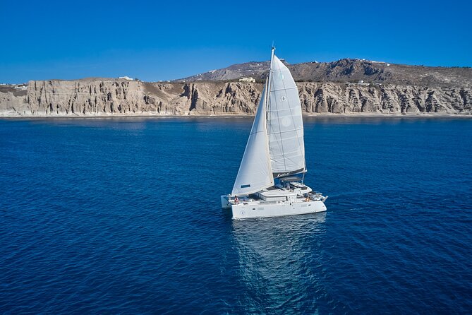 Santorini Oia: Caldera Private Day Cruise with BBQ & Drinks - Stop 2 Palea Kameni: volcano rocks and sulfur-spring water time