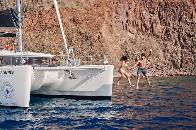 Santorini Oia: Luxury Sunset Cruise with Fresh Fish BBQ & Drinks - Stop 1: Thirassia, a Calm Bay Swim Near a Time-Worn Island Feel
