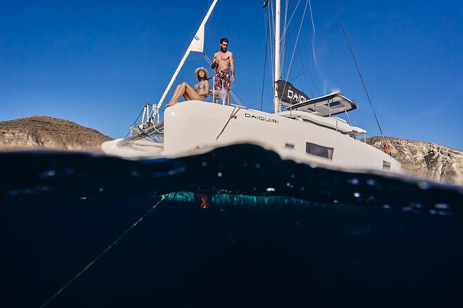 Santorini Oia: Luxury Sunset Cruise with Fresh Fish BBQ & Drinks - Volcanic Water Time: Santorini’s Sulfur Springs Feel