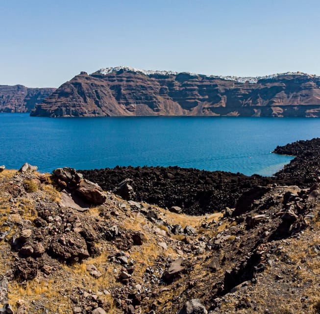 Santorini Port: 3 Hour Cruise to Volcano and Hot Springs - Meeting in Fira Old Port, Timing, and What to Expect on Board