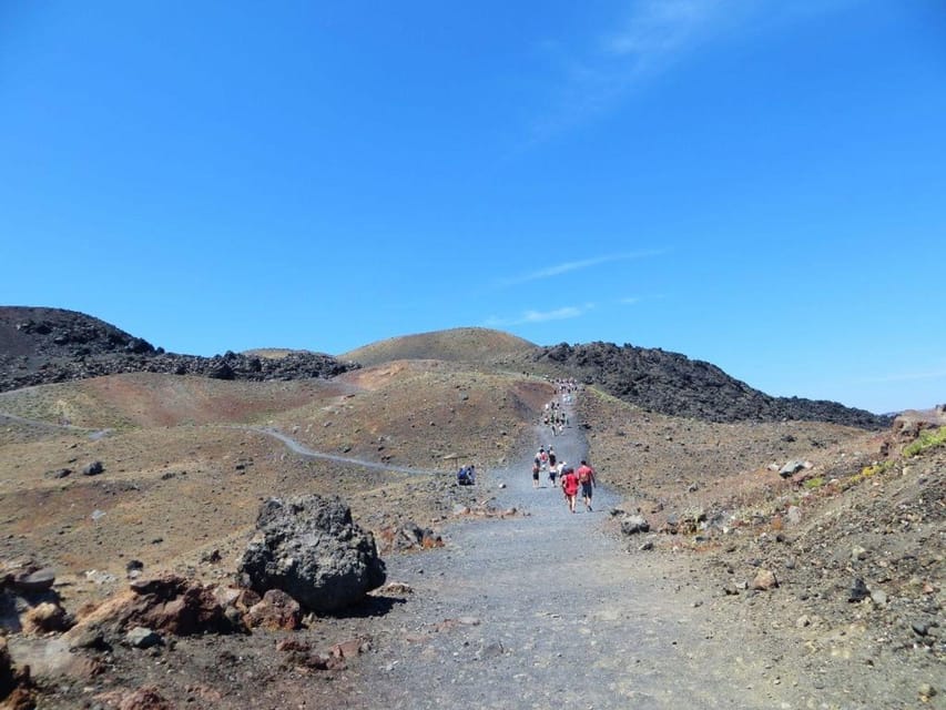 Santorini Port: Cruise to Volcano, Hot Springs & Thirassia - On-board experience: guide + audio commentary, the bar, and the views from the Caldera