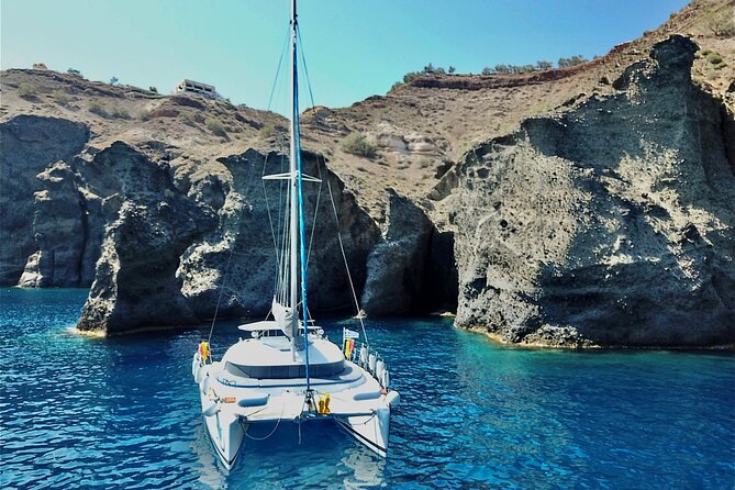 Santorini: Premium Small-Group Catamaran Cruise with Food/Drinks - The safety and boarding rules that actually affect your comfort