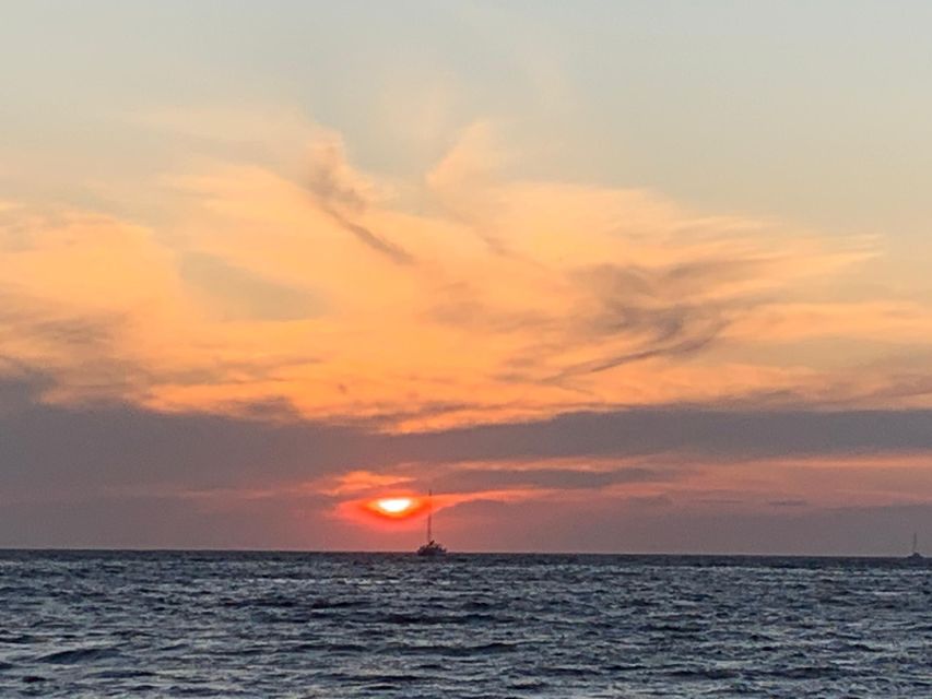 Santorini: Private 5-Hour Sunset Sailing Tour with Dinner - Sailing toward legends and the exact moment the sun starts to drop