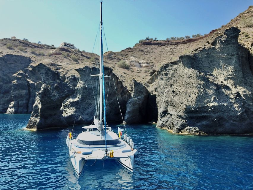 Santorini: Private All-In Catamaran Cruise, with Food|Drinks - From Thera pick-up to the safety briefing you actually should listen to