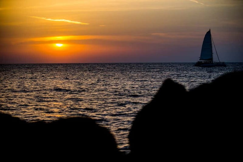 Santorini: Private Catamaran Cruise with BBQ Meal and Drinks - Aspronissi Cliffs, Boat-Only Coasts, and Caves Near Fira