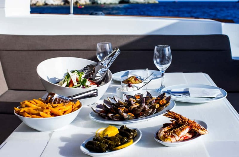 Santorini: Private Catamaran Cruise with BBQ Meal and Drinks - Onboard Comfort: Blankets, Towels, Wi-Fi, and a Deck That Feels Yours