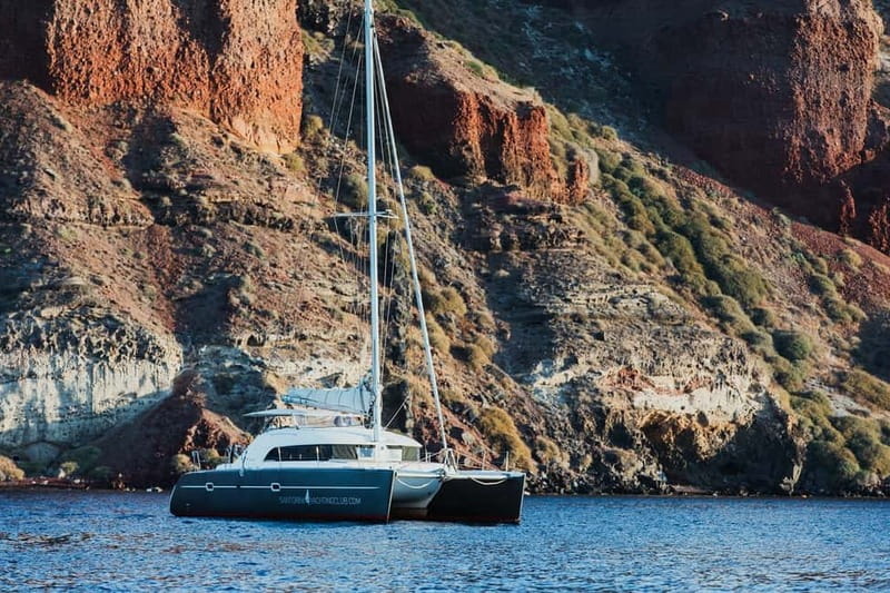 Santorini: Private Catamaran Cruise with BBQ Meal and Drinks - Thirassia and Manolas Village Views: A Different Side of Santorini
