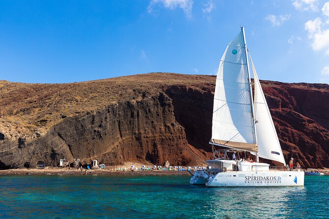 Santorini Private Catamaran Cruise with BBQ, Open Bar & Transfers - Transfers and meeting point, and the one cruise-ship catch at Old Port of Fira