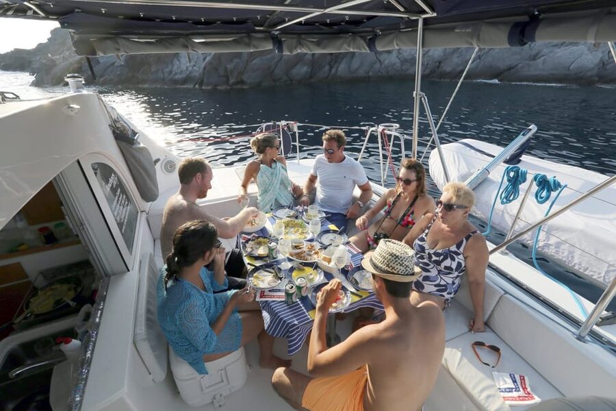 Santorini: Private Catamaran Cruise with Food & Drinks - Santorini Volcano Swim Time: When the Boat Becomes Part of the Story