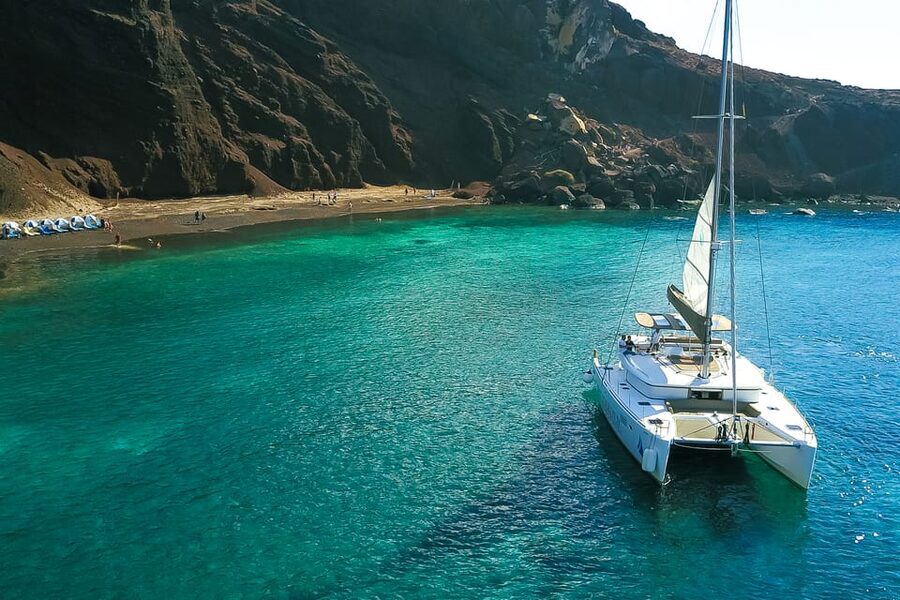 Santorini: Private Catamaran Tour with BBQ Meal and Drinks - Manolas in Thirasia: a calmer sighting to close the loop
