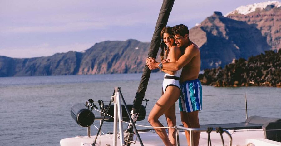 Santorini: Private Catamaran Tour with BBQ Meal and Drinks - The catamaran comfort setup: sun, shade, and room to breathe