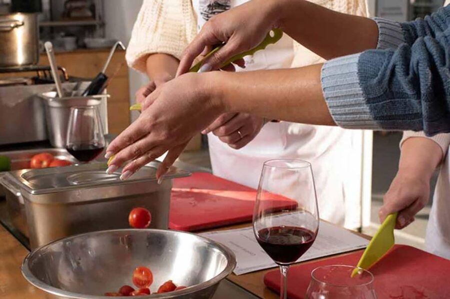 Santorini: Private Cooking Class and Wine Tasting Tour - The Greek cooking class at a traditional restaurant: hands-on, recipes included