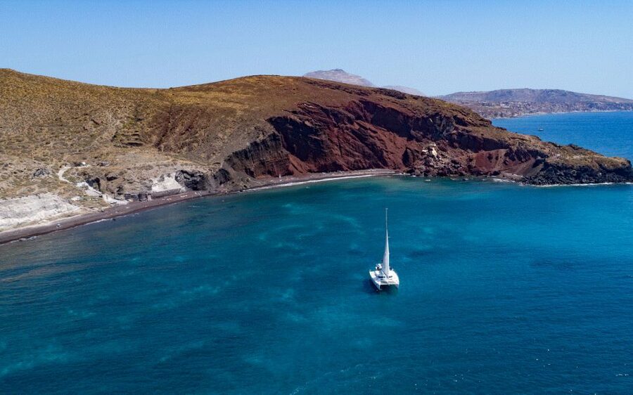 Santorini: Private Day Cruise with a BBQ meal and Open Bar - Caldera Views From a Private Catamaran
