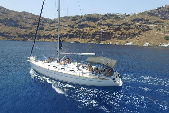Santorini Private Daytime Sailing Cruise with Meal, Drinks &Transfer included - Crossing the caldera for volcano views, Cape lighthouse, and hot springs