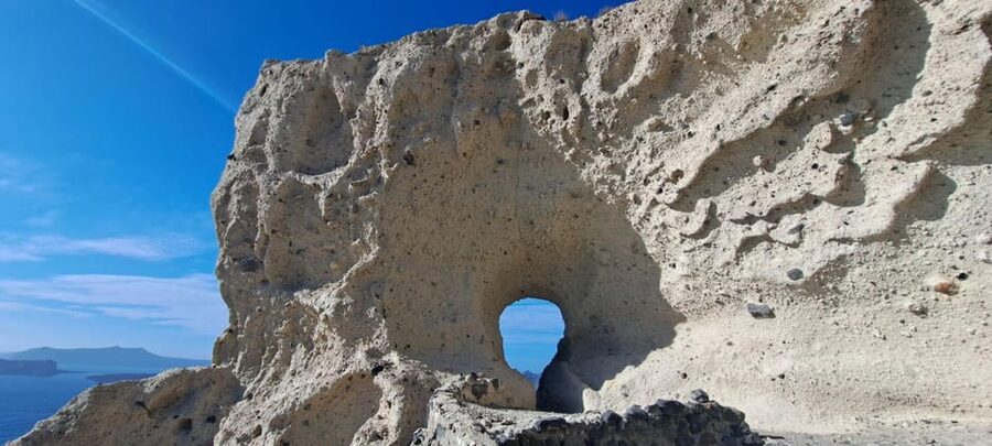 Santorini: Private Tour in Spanish with Local Guide - Red Beach at Akrotiri, volcanic rocks and red sand