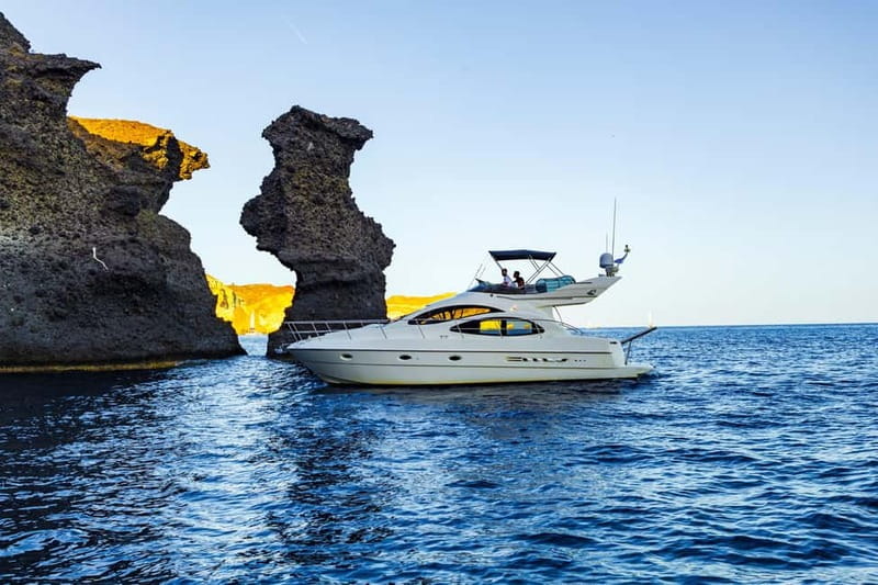 Santorini: Private Yacht Experience of Timeless Elegance - Cruising the Caldera: Red Beach and White Beach from the Water