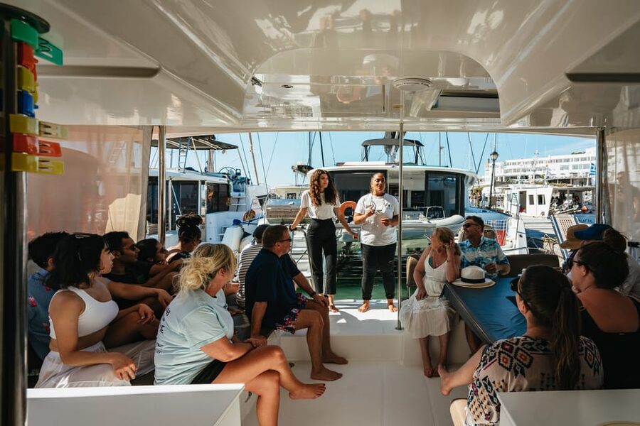 Santorini: Sailing Catamaran Cruise with BBQ and Drinks - Red Beach: the fast swim stop with big geology vibes