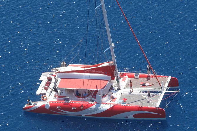 Santorini Sailing Dream Catcher with BBQ Lunch and Drinks - Sailing by Old Venetian Lighthouse and Indian Head Mountain