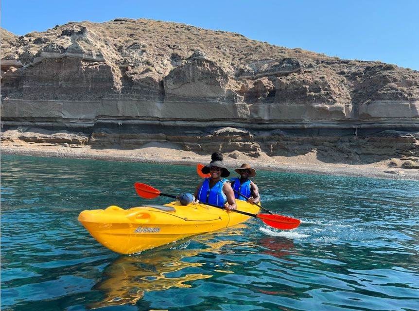 Santorini: Sea Caves Kayak Trip with Snorkeling and Picnic - White Beach cliff jumping: adrenaline with safety in mind