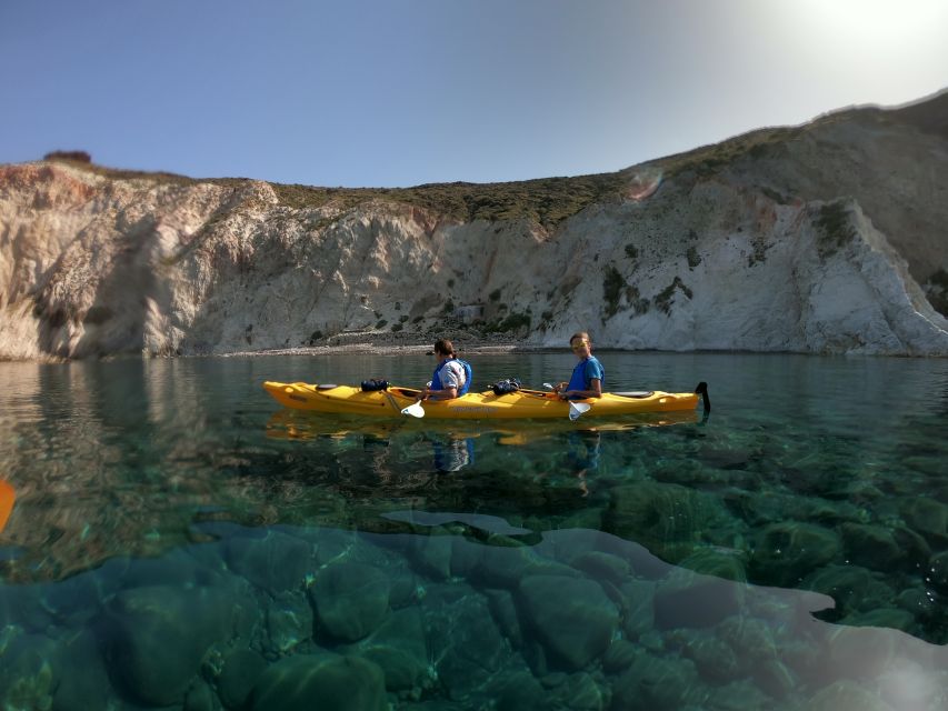 Santorini: Sea Caves Kayak Trip with Snorkeling and Picnic - The sea caves and the blue light effect