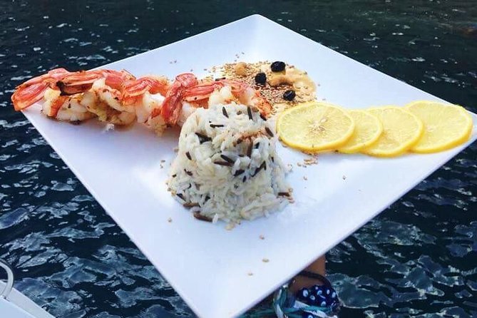 Santorini Small-Group Catamaran Sailing Trip(BBQ,drinks, transfer) - The crew vibe, music, and the names you might hear on board