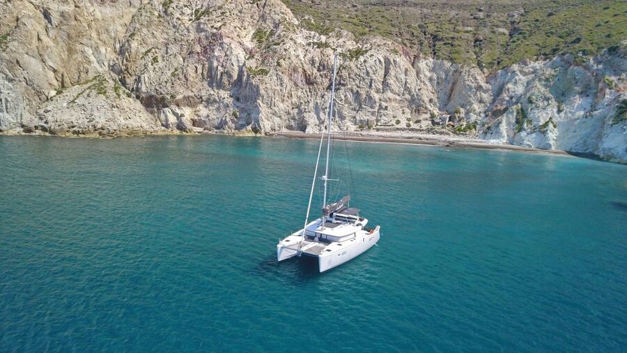 Santorini: Southern Island Luxury Catamaran Cruise with Meal - Red Beach and White Beach: Scarlet Rocks, Photo Cliffs, and Short Swim Time