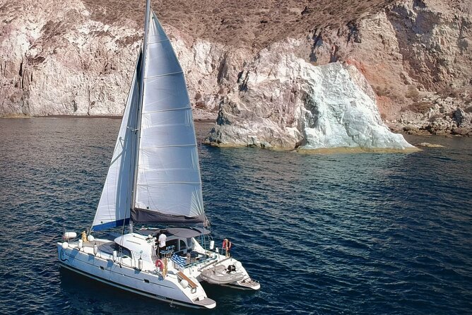 Santorini: Standard Small-Group Catamaran Cruise with Food/Drinks - Red Beach Swim Time: The Stop That Tends to Decide Your Mood