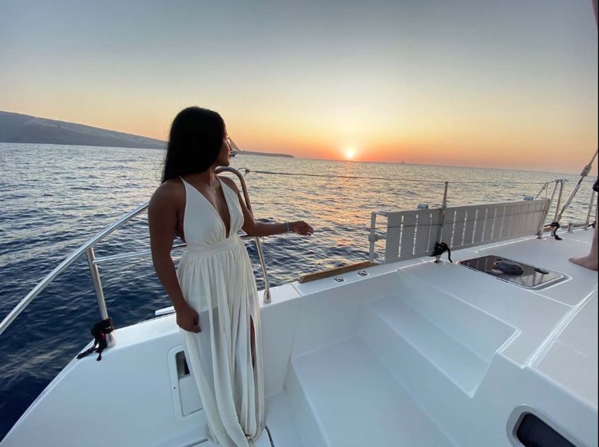 Santorini: Sunset Cruise with Greek Dinner and Transfer - Boarding day: smooth hotel pickup and a calm start