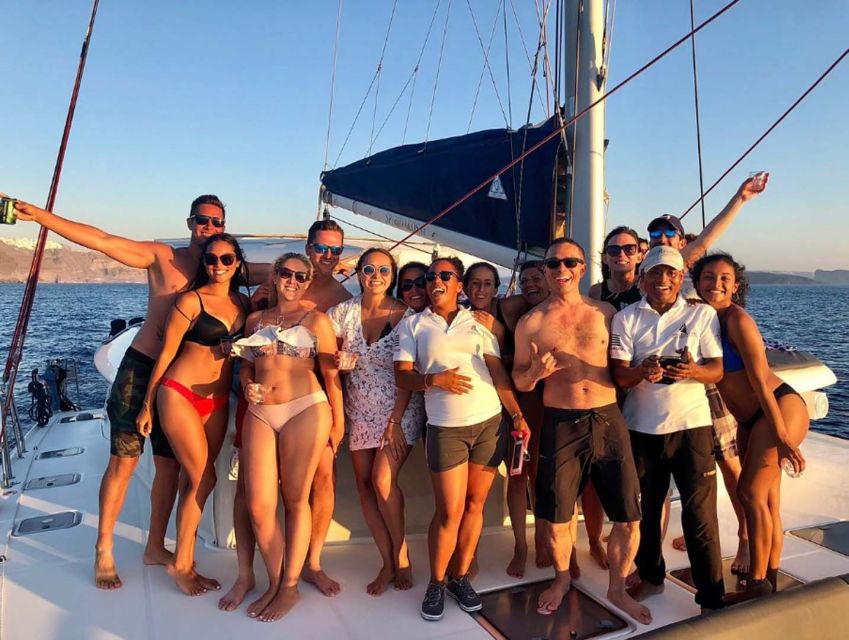 Santorini: Sunset Cruise with Greek Dinner and Transfer - Nea Kameni and Palea Kameni: the volcanic warm water moment
