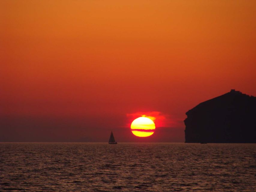 Santorini: Sunset Cruise with Greek Dinner and Transfer - The dinner on board: full Greek meal, not a snack plate