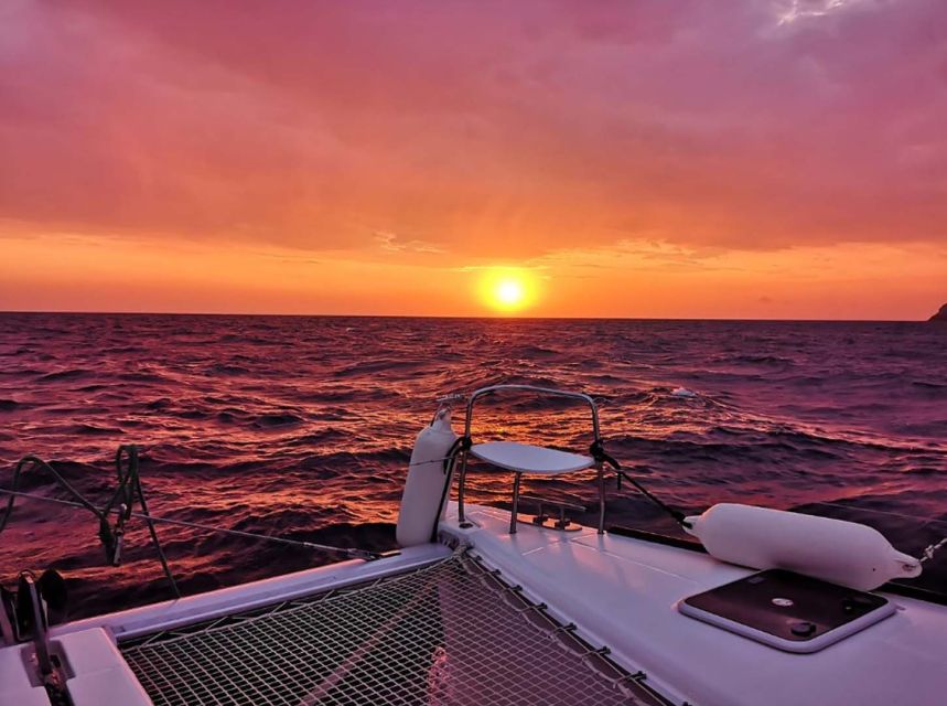 Santorini: Sunset Cruise with Greek Dinner and Transfer - Crew energy and the camera help that actually matters