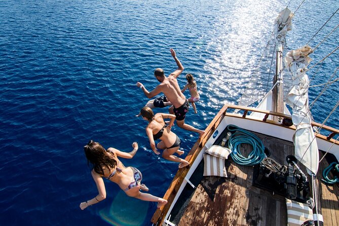 Santorini Sunset Dinner Cruise Including Nea Kameni Visit - Pickup timing, meeting points, and how to avoid the most common stress