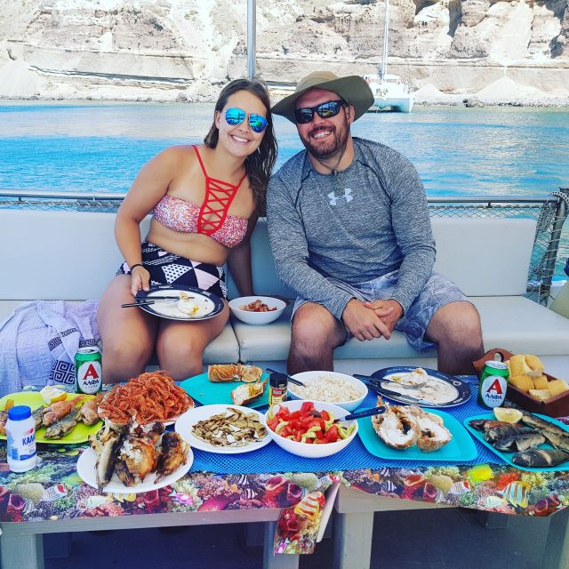 Santorini Sunset Fishing Trip with Dinner and Drinks - Cooked Aboard Dinner, Unlimited Local Drinks, and Fish Rules