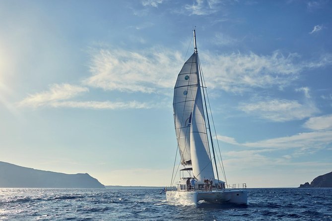 Santorini Sunset Luxury Sailing Catamaran Cruise with BBQ, drinks, transfer - What to pack so the day stays fun, not fussy