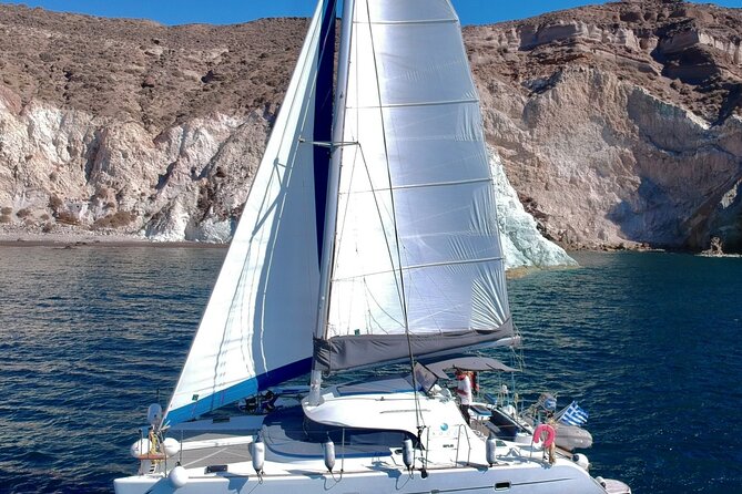 Santorini Sunset:Private All-In Catamaran Cruise (Food&Drinks) - Dinner and drinks: what’s actually included, and how it changes the value