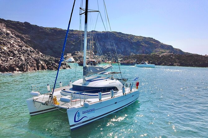 Santorini Sunset:Private All-In Catamaran Cruise (Food&Drinks) - The early sailing stops: Red Beach swim and the White Beach photo moment
