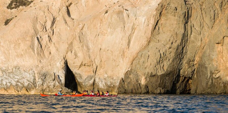 Santorini: Sunset Sea Kayak with Light Dinner - Snack lunch at a traditional taverna, then dry clothes
