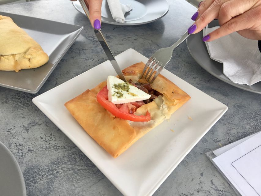 Santorini: Sunset Walking Tour with Local Food and Drinks - The drink plan: volcanic wine, beer, and a guided three-spirits ritual
