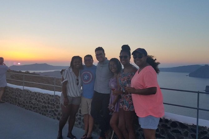 Santorini Sunset Wine Tour with Santo Winery Views - Pickup, minivan ride, and the small-group rhythm (max 15)