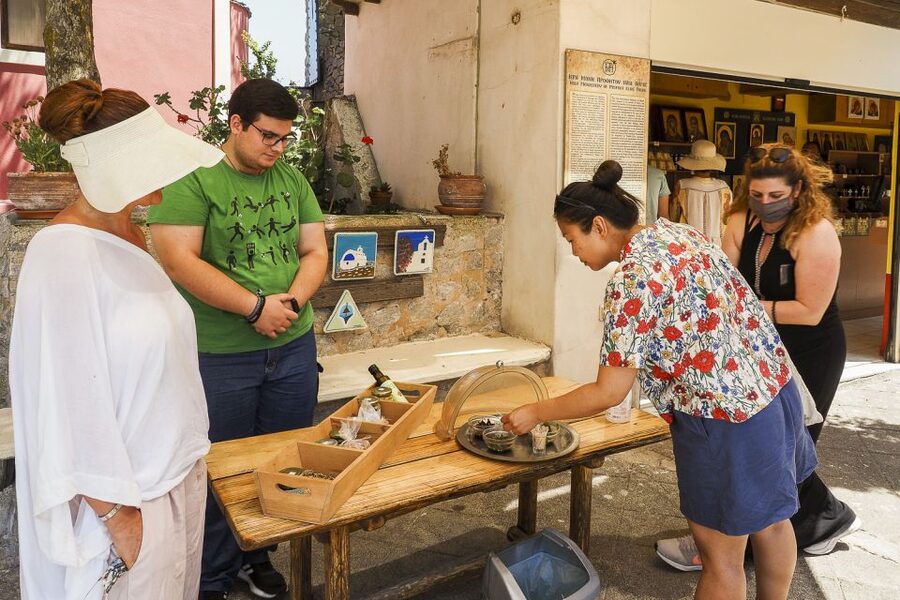 Santorini: Top Sights Day Trip, Wine Tasting, & Oia Sunset - Pyrgos Kallistis: winding streets and the castle viewpoint