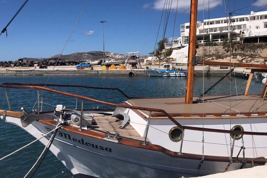 Santorini: Traditional Wooden Boat Tour with Meal and Wine - Black Mountain Stop: The Swim and Snorkel Portion You Actually Remember