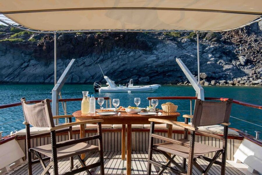 Santorini: Traditional Wooden Boat Tour with Meal and Wine - Hot Springs by the Volcano: A Geothermal Swim That Feels Weird in the Best Way