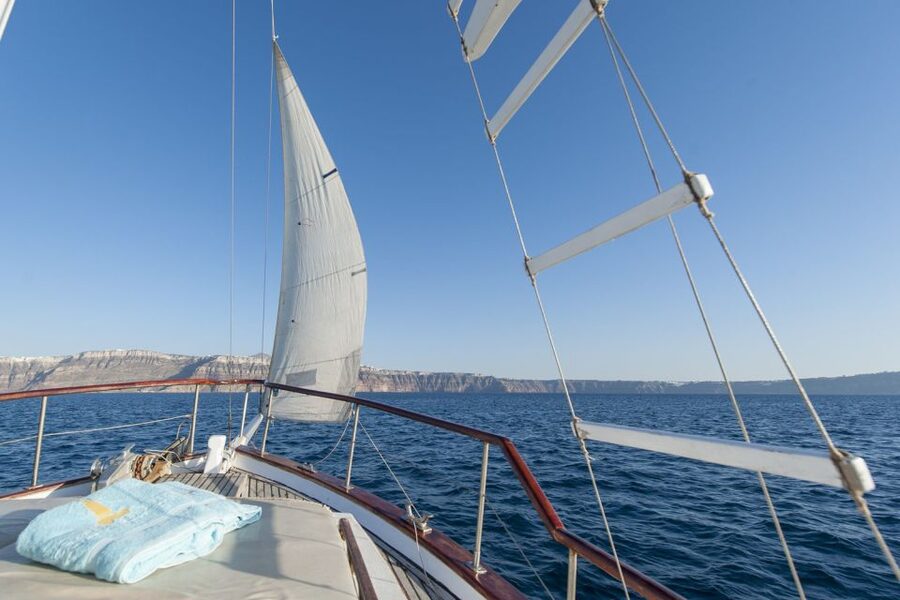 Santorini: Traditional Wooden Boat Tour with Meal and Wine - Thirassia Island: Fishermen Quiet, Plus Another Chance to Snorkel