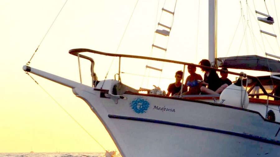 Santorini: Traditional Wooden Boat Tour with Meal and Wine - Getting There: Hotel Pickup, Then a Straight Shot to Vlychada