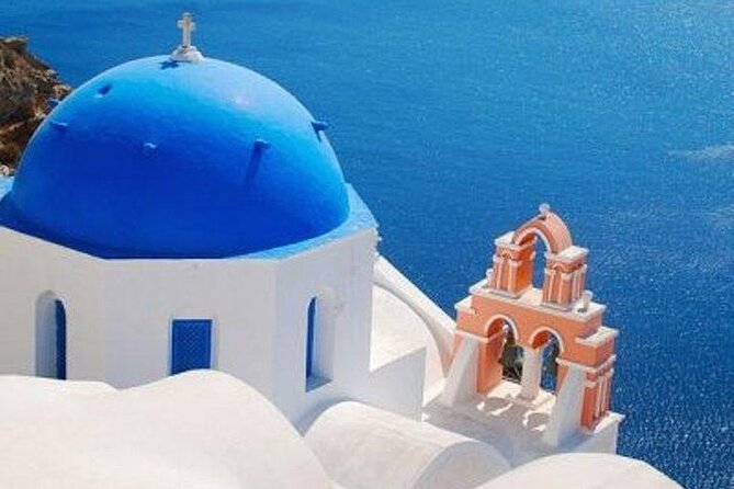 Santorini Ultimate Destinations - Oia’s main street and the blue-domed viewpoint rhythm