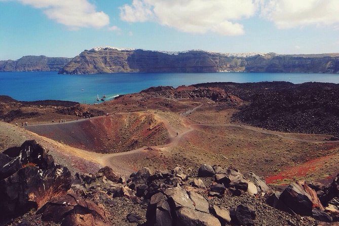 Santorini Volcanic Islands Cruise: Volcano, Hot Springs and Thirassia - Getting there: bus pickup times and the port meeting point