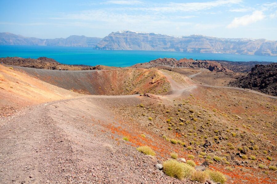 Santorini: Volcano and Hot Springs Sunset Dinner Cruise - Palia Kameni Hot Springs: Swim Warm Sulfur Water, Then Rinse