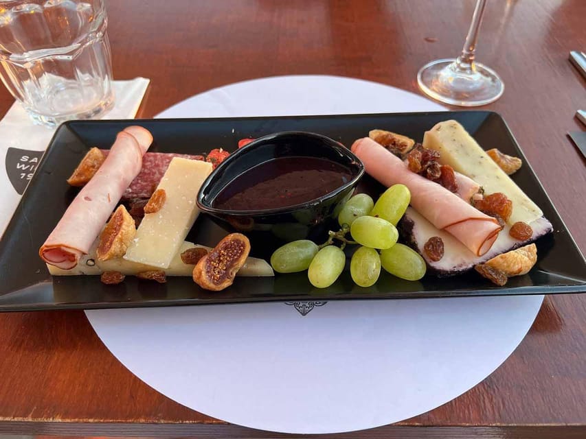 Santorini: Wine Tasting Tour with Snacks - Cheese and Snacks: Practical Pairing, Not Just Food on the Side