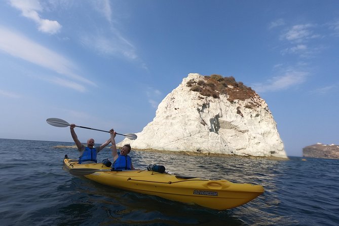 Small-Group Santorini Sea Caves Kayak Trip with Snorkeling & Picnic - Stop 3: The Lighthouse stretch, caves, and that blue-water light