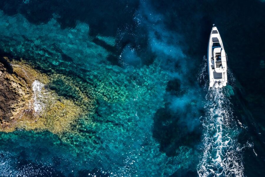 The Fastest All Inclusive Private Motor Yacht in Santorini - Santorini Caldera photo time, then into volcanic waters